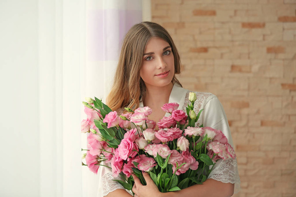 Pretty girl holding big bouquet - Фото, зображення