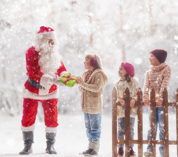 Santa Claus presents gifts - Fotó, kép