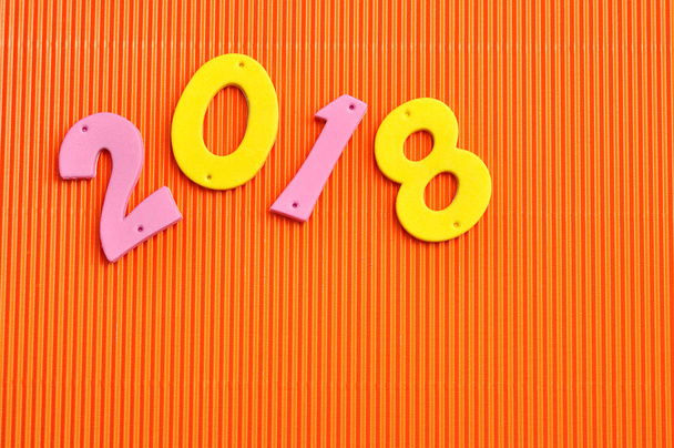 2018 in pink and yellow numbers  - Valokuva, kuva