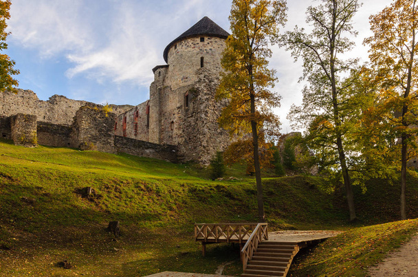 Autumn park with old castle ruins in Cesis town, Latvia - Photo, image