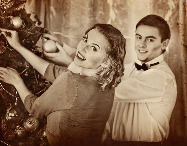 Couple on Christmas party. Black and white retro. - Photo, Image