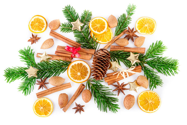 Christmas composition with winter spices on white. Flat lay, top view - Photo, Image