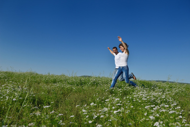 Happy couple in wheat field - Photo, Image