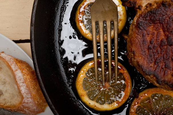 pork chop seared on iron skillet - Photo, Image