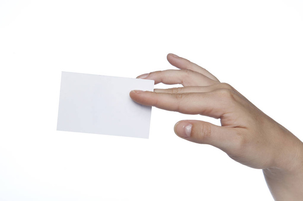 rectangular white sheet held in the fingers, copy space - Foto, Bild