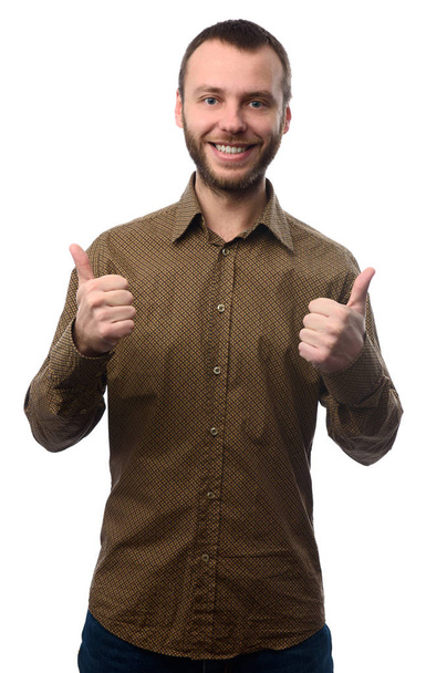 young man showing thumbs up - Фото, изображение