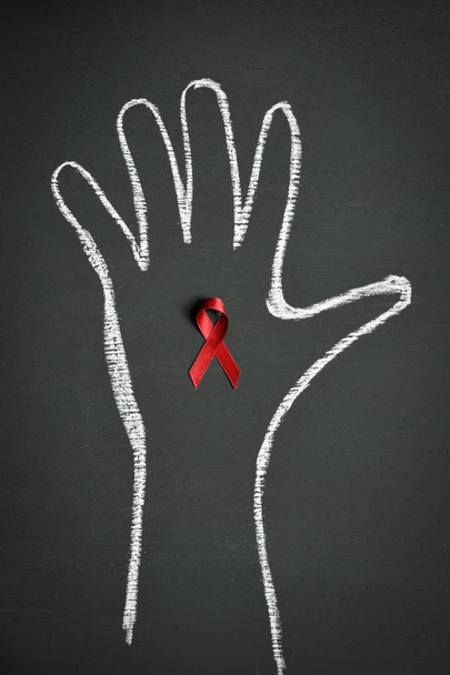 red ribbon for the fight against AIDS - Photo, Image