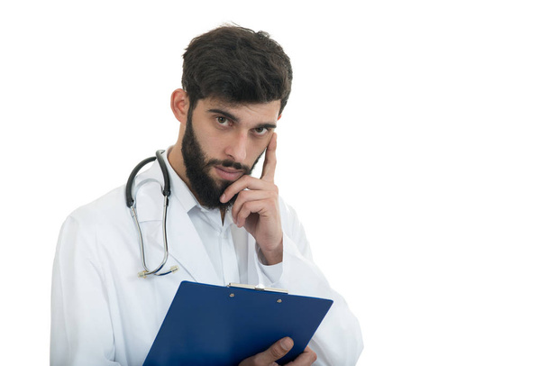 Male Doctor holding folder and stethoscope - Foto, imagen