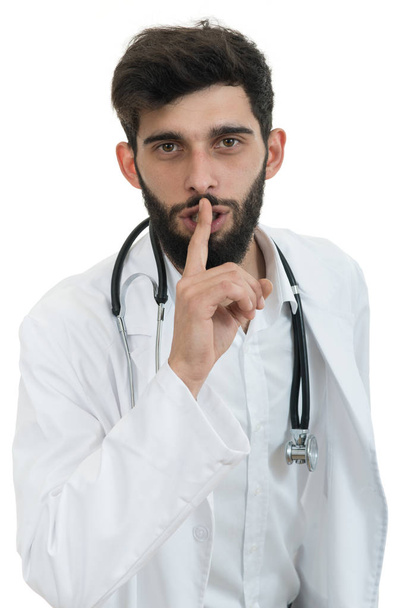 Male doctor instruct to keep silence - Foto, Bild
