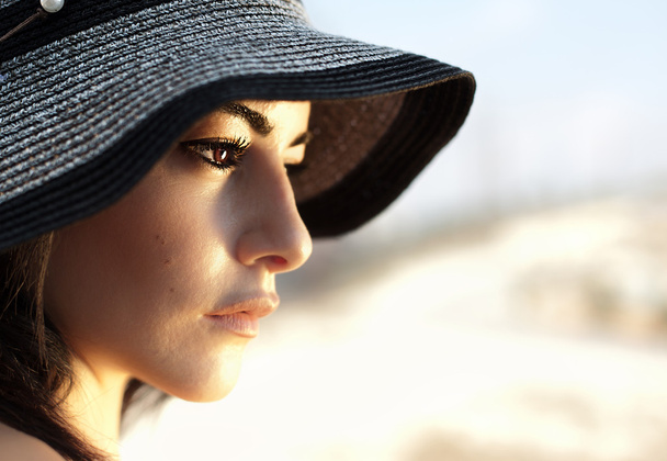 Attractive female wearing hat - Fotó, kép