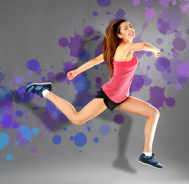 sporty woman jumping - 写真・画像