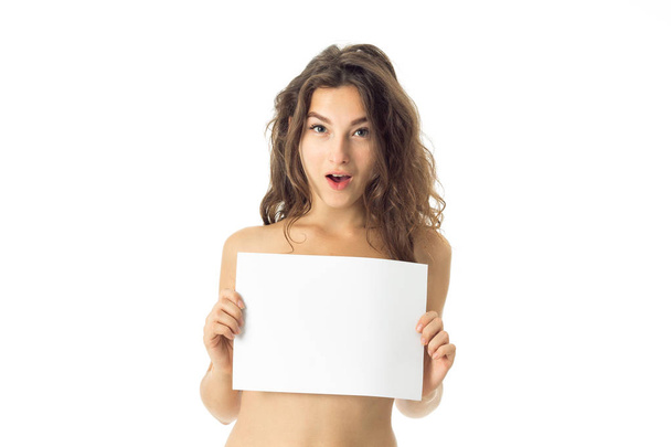 nude brunette girl with placard - Foto, immagini
