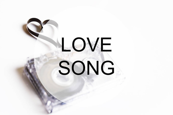 love song background om audio cassette tape shape heart - Φωτογραφία, εικόνα