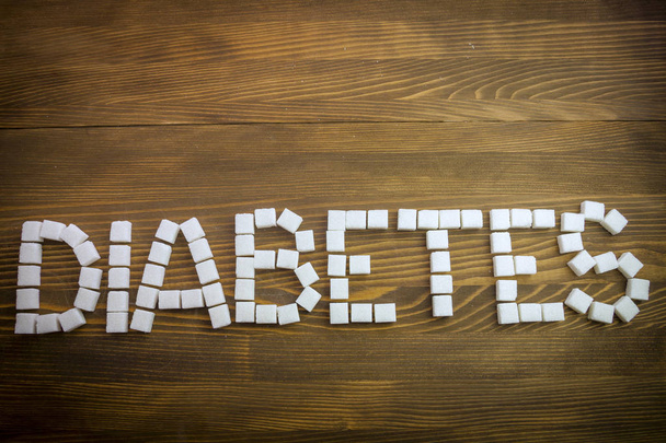 Diabetes mit Zuckerwürfeln geschrieben - Foto, Bild