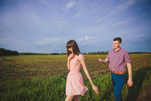 young couple in love together on nature - Fotoğraf, Görsel