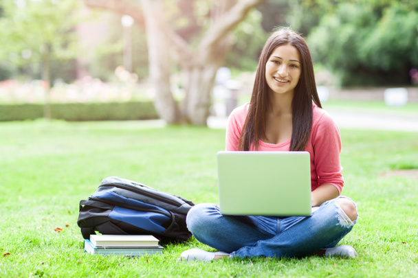Hispanic college student with laptop - Photo, Image