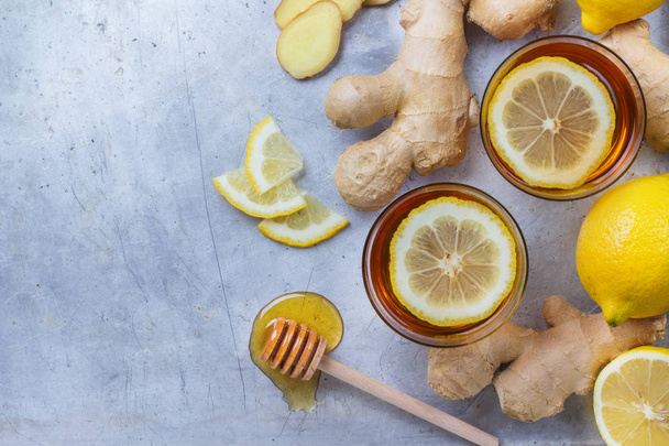 Ginger tea in a glass for flu cold winter days - Фото, изображение