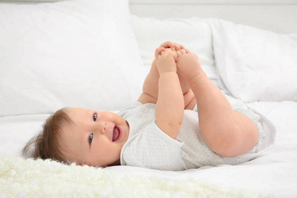 Cute baby lying on bed - Photo, image