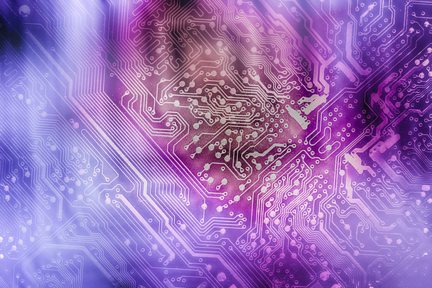 Circuit board. Electronic computer hardware technology. Motherboard digital chip. Tech science background. Integrated communication processor. Information engineering component. Blue and violet colors - Photo, Image