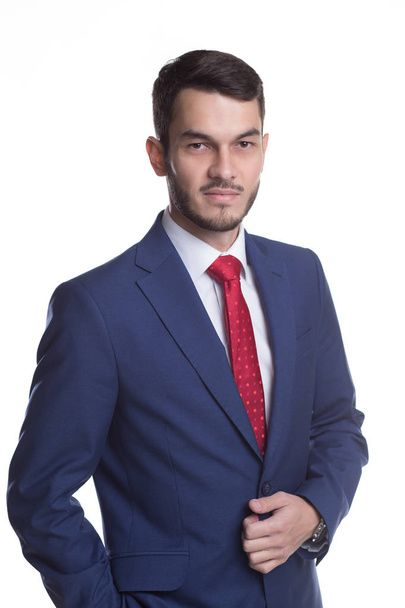 Businessman in suit with red tie standing on white background - Φωτογραφία, εικόνα