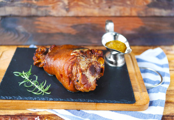 Roasted pork leg (rulka) served with garlic sauce - Photo, Image