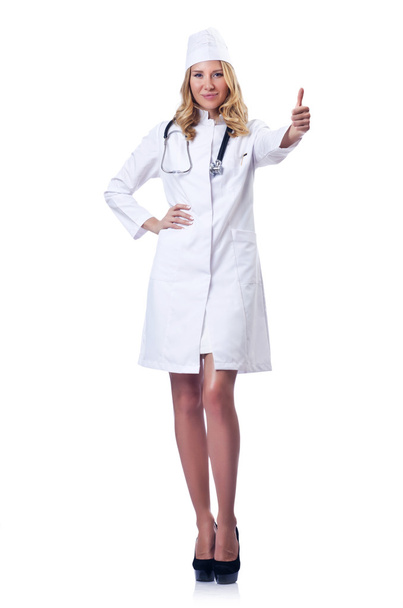 Young woman doctor on white - Фото, зображення