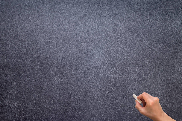Hand draw somethings on blackboard with chalk - Photo, image