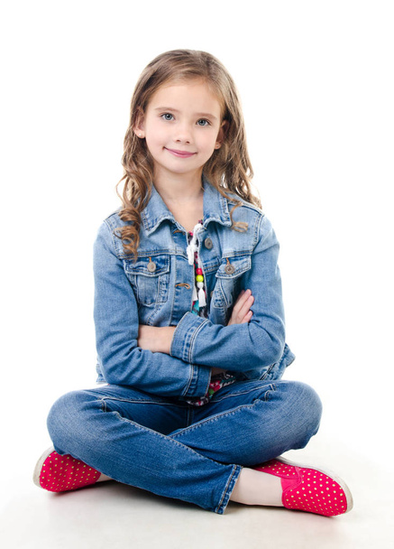 Adorable smiling  little girl sitting on a floor - Zdjęcie, obraz