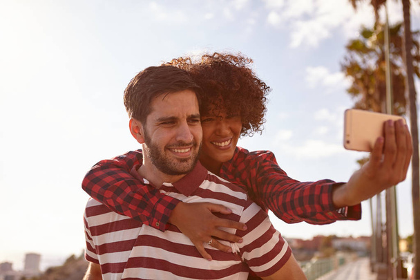 young couple taking selfie - Фото, изображение