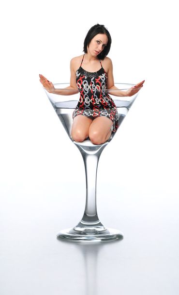 Young brunette in a martini glass - Фото, зображення