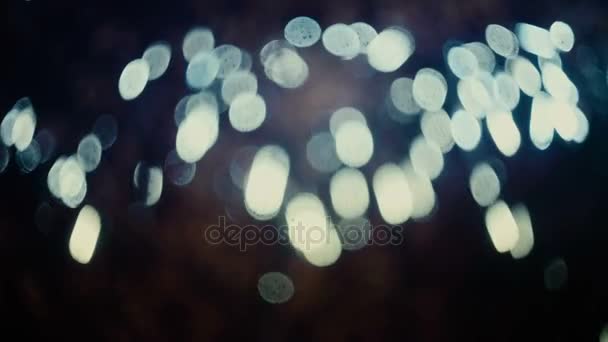 Colorful, blurred, bokeh lights background in cold tones. Abstract sparkles. - Footage, Video
