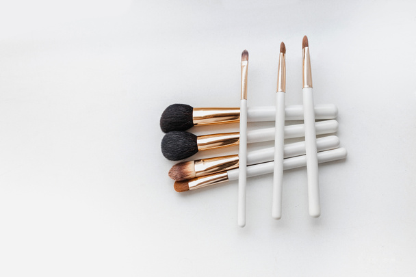 set of many various brushes for makeup on white background - Photo, Image