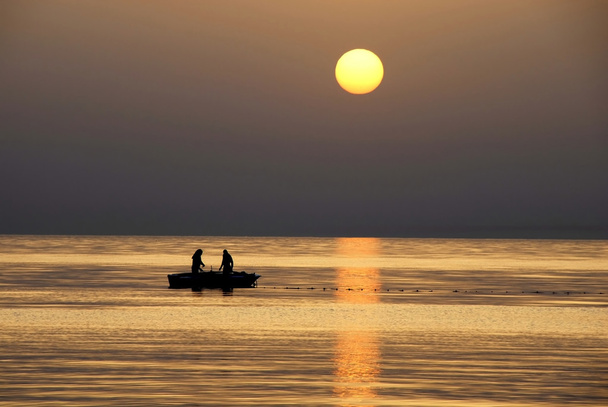 Pêche au lever du soleil
 - Photo, image