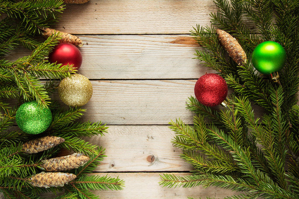 Colored Christmas balls with fir branches - Φωτογραφία, εικόνα