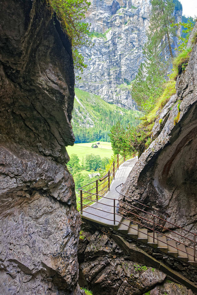 Gorge with stairs in Trummelbach falls in Lauterbrunnen Bern Switzerland - Photo, Image