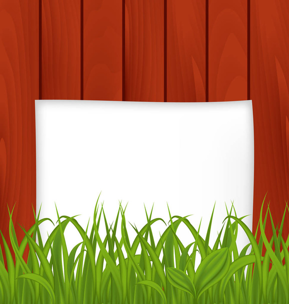 Paper sheet and green grass on wooden texture - Photo, image