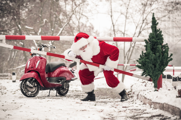 Santa Claus přelézali hráz - Fotografie, Obrázek