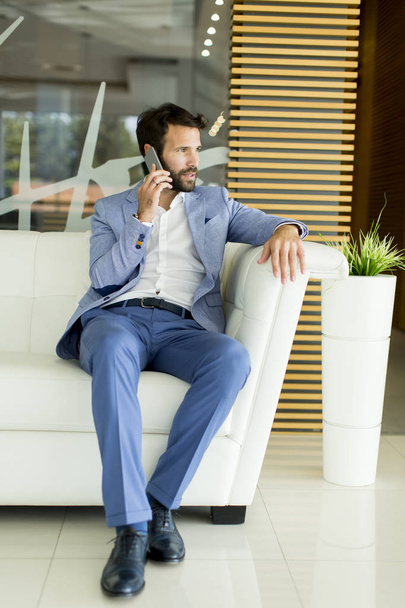 Modern businessman in office - Photo, image