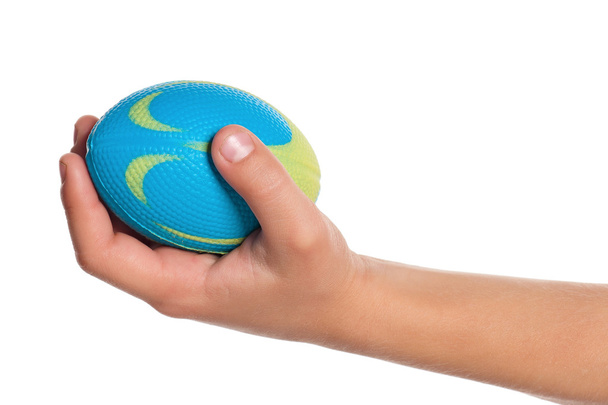 Boy hand with small ball - Foto, afbeelding