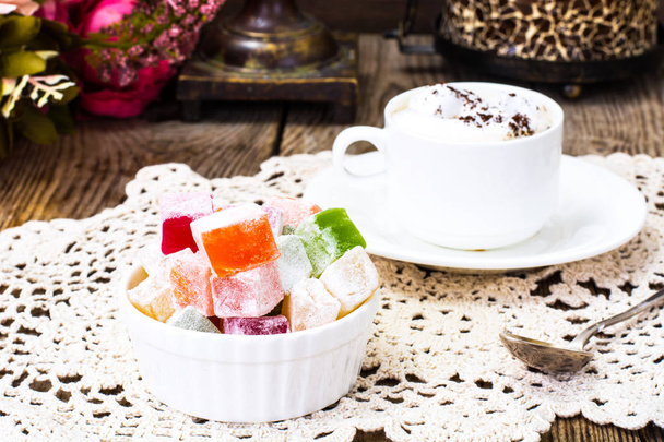 Eastern dessert Turkish delight and coffee with cream - Photo, Image