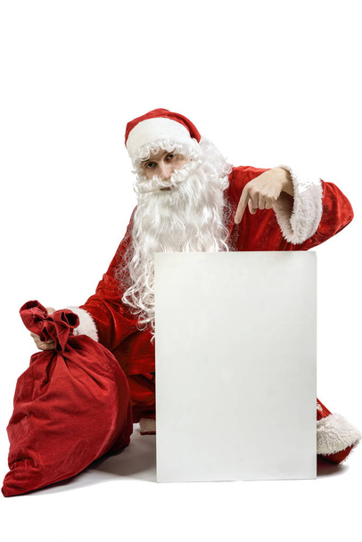 Santa Claus with a bag of gifts - Photo, Image
