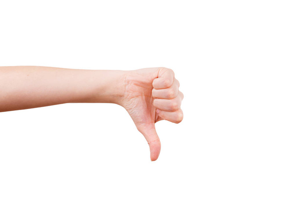 Female hand gesturing thumb down sign - Foto, afbeelding