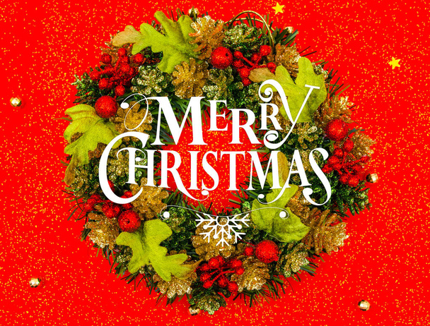 Christmas wreath  on red background . - Fotografie, Obrázek