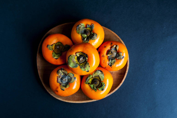 Ripe orange persimmon fruit - Foto, immagini
