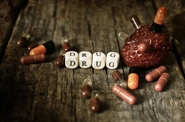 old shabby filthy Photo drug pill on wooden table concept addict - Photo, Image