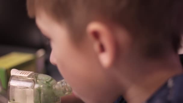 Child boy with inhaler - Footage, Video