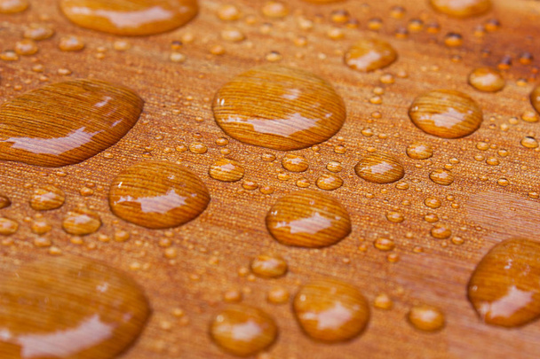 water beads on treated cedar deck - Photo, Image