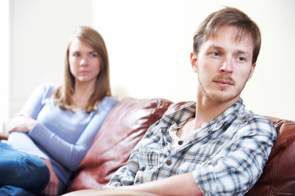 Couple With Relationship Difficulties Sitting On Sofa - Foto, Bild