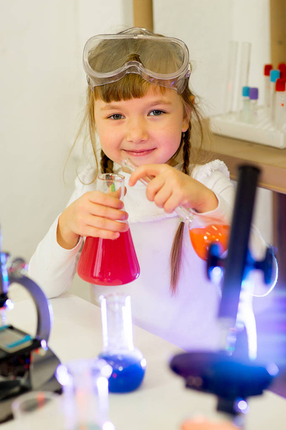 young girl making science experiments - Photo, image