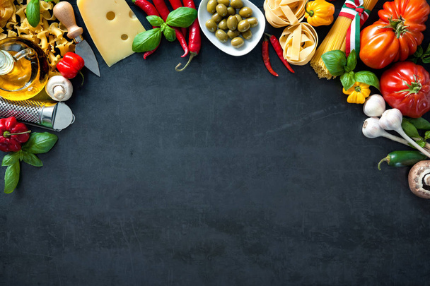 Italian food ingredients on slate background - Foto, afbeelding